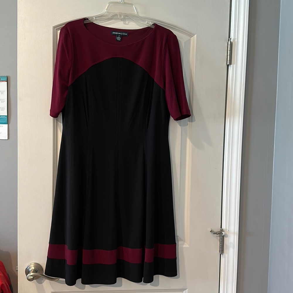Quarter sleeve work dress. Worn once.  Maroon top and stripped bottom